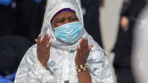 A Muslim pilgrim prays at Mecca's Grand Mosque during Hajj (31 July 2020)