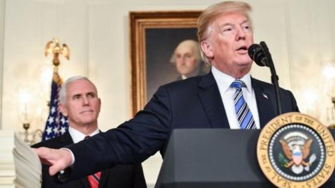 US President Donald Trump speaks about the spending bill during a press conference at the White House.