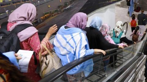 A group of 175 Afghan citizens arriving at the Mexico City International Airport.