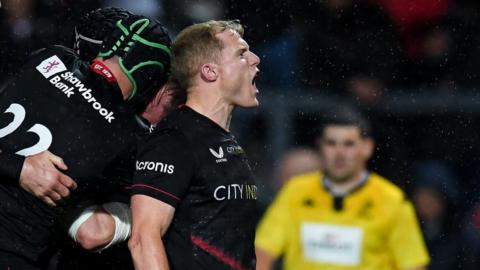 Saracens celebrate Aled Davies' try