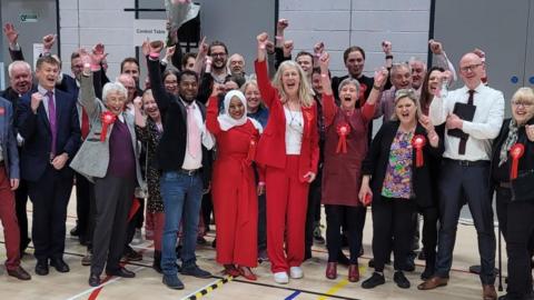 Labour supporters and councillors celebrate