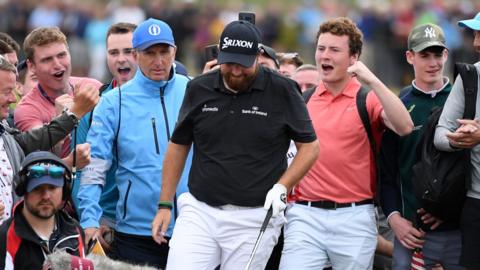 Supporters cheer on Shane Lowry during the Irishman's third round at The Open at Royal Portrush