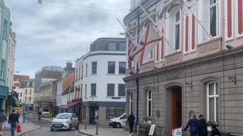 Jersey flags being flown at half mast