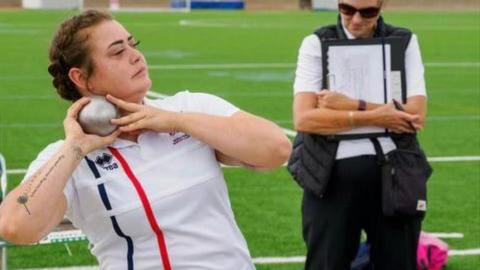 Keeleigh John doing shot put