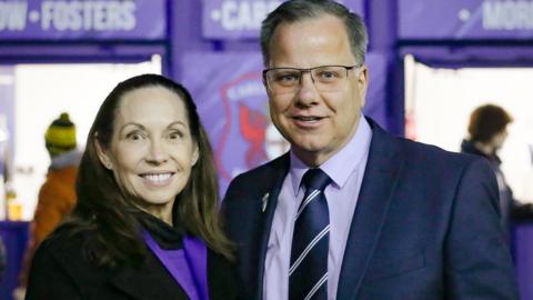 Patti and Tom Piatak at a Carlisle game