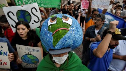 People take part in a protest in Cali, Colombia in 2019