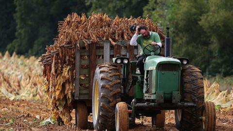 farmer on tractor