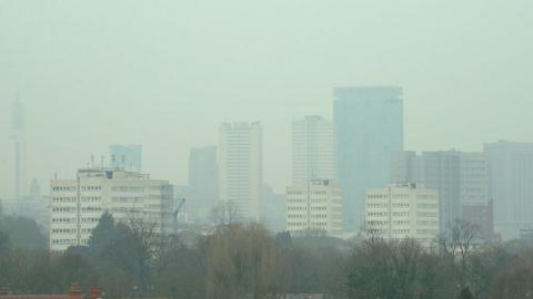 The Birmingham skyline showing smog in the sky