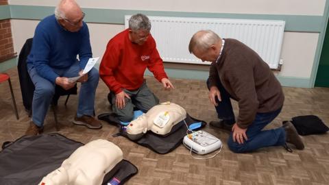 people doing CPR training