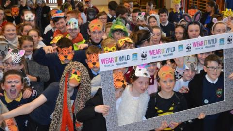 Pupils in fancy dress raising awareness of endangered animals