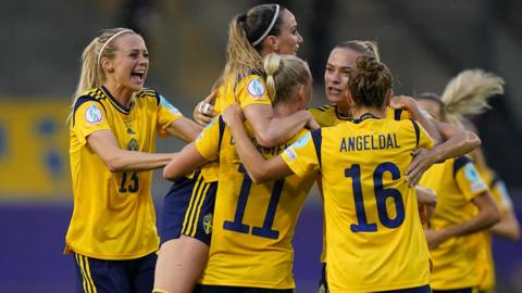 Sweden's players celebrate a goal that was disallowed against Belgium at Euro 2022