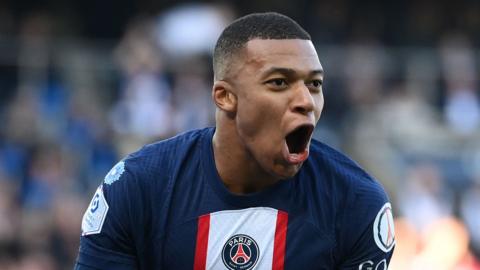 Paris Saint-Germain's Kylian Mbappe celebrates scoring the first goal in Ligue 1 match v Auxerre