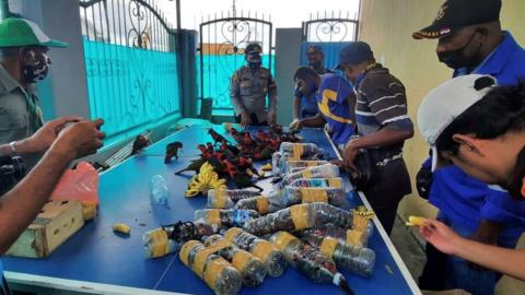 The parrots were freed from the bottles when found in Fakfak in Indonesia's West Papua region