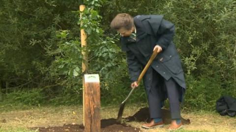 Princess Anne planting a tree