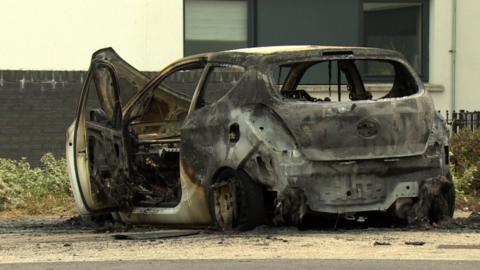 Burnt out car