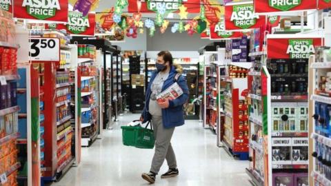 Shopper in Asda at Christmas