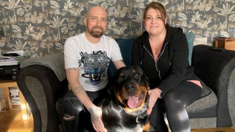 Craig Bould with his wife Nicola and their dog Reggie