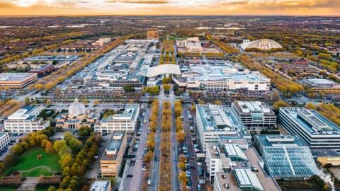 Drone shot of Milton Keynes Central at sunset