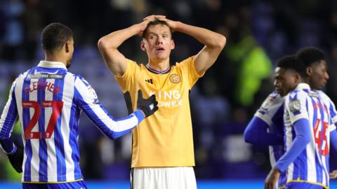 Leicester's Jannik Vestergaard with his hands on his head after his last-gasp attempt of a winner was saved