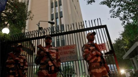 Border Police stand guard outside a building housing BBC offices, where income tax officials are conducting a search for a second day, in New Delhi, India, February 15, 2023