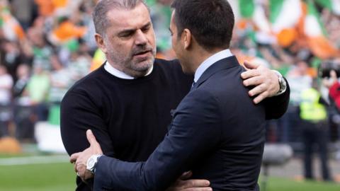 Celtic manager Ange Postecoglou embraces Rangers counterpart Giovanni van Bronckhorst