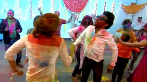 People in Hull celebrate Holi with colours and dancnig