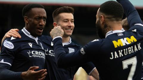 Dundee players celebrate