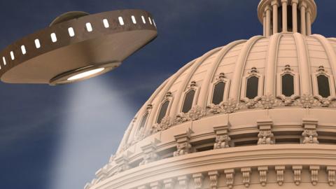 A UFO hovers above the US Congress - in an illustration