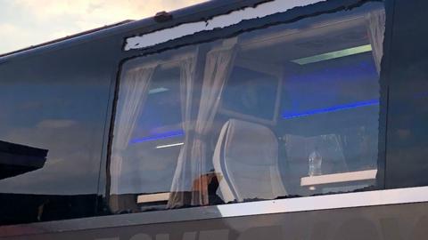 A smashed window on Real Madrid's team bus