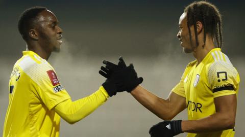 Fulham's Neeskens Kebano celebrates scoring their second goal with teammate Bobby Decordova-Reid