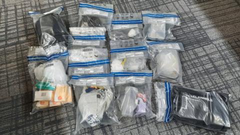 The police released a photo of the items seized during the search