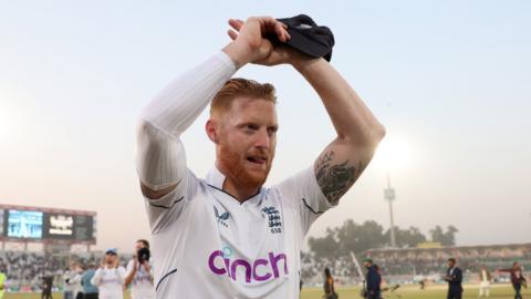 Ben Stokes clapping as he walks off the putch