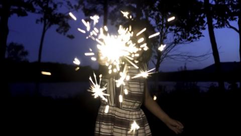 A child with a sparkler