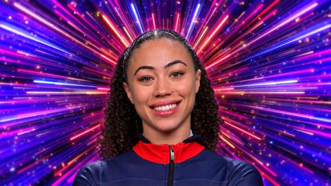 Tabby Stoecker in front of a Strictly Come Dance purple, red and blue backdrop