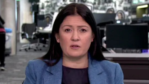 Lisa Nandy close up. She's sitting down, wearing a light blue blazer and a dark top