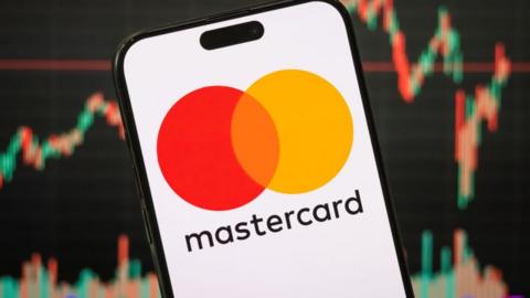 Mastercard logo seen on a mobile phone