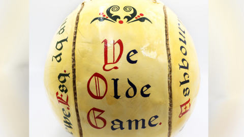 Royal Shrovetide ball inscribed with the words - Ye Olde Game.