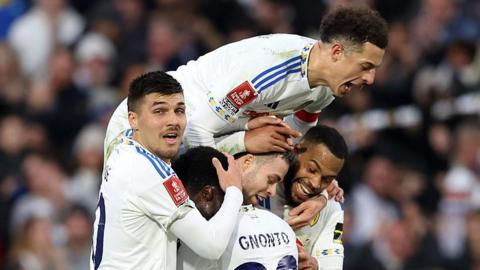 Leeds players celebrate scoring against Norwich