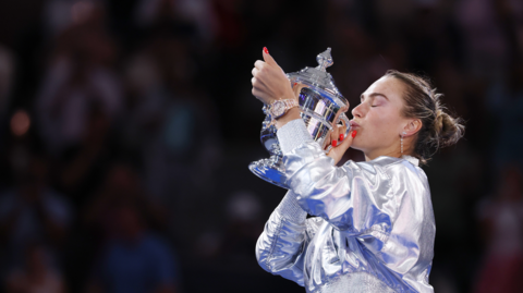 Aryna Sabalenka poses with US Open trophy