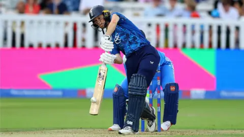 England batter Amy Jones plays a shot