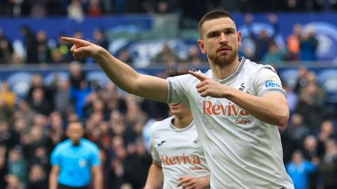 Zan Vipotnik celebrates putting Swansea in front against Stoke