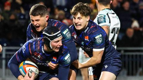 Edinburgh's Harry Paterson celebrates his try against Ospreys