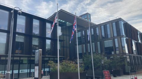 The modern glass and steel fronted One Angel Square, home of West Northamptonshire Council.