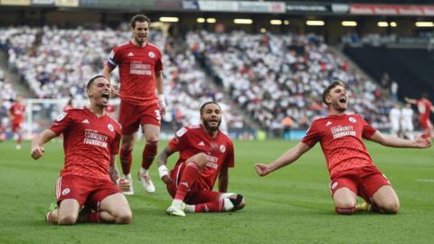 Crawley Town players celebrate