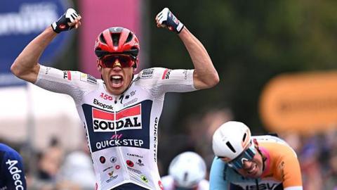 Paul Magnier celebrates winning stage one of the 2026 Giro d'Italia
