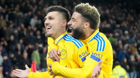 Leeds players celebrate a goal