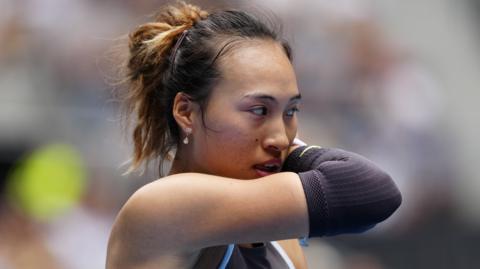 Zheng Qinwen reacts to a point during the Australian Open