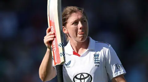 Heather Knight acknowledges the crowd after being dismissed in her final England innings