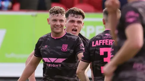 Ballymena celebrate goal