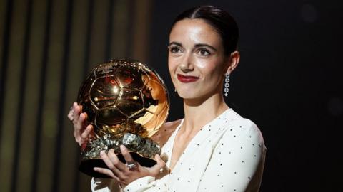 Barcelona's Spanish midfielder Aitana Bonmati receives the women's Ballon d'Or award